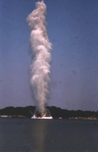 Picture of a bomb being detonated under water.
